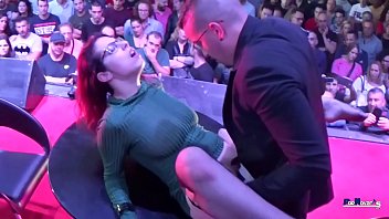 Slut with gorgeous thighs in public takes part in a porn show