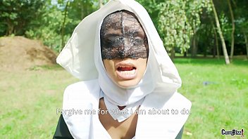 A nun in the woods takes part in a secret sexual ritual